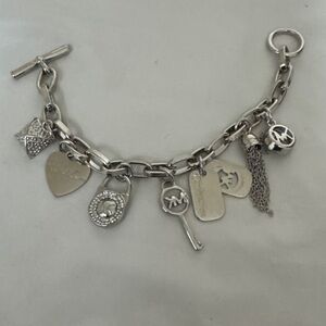Michael Kors Silver-Tone Charm Toggle Bracelet with Tassel